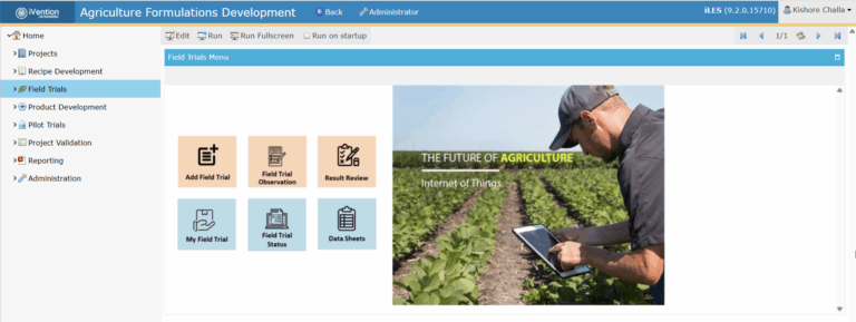Scientist analyzing chemical formulations using iLES Agrochemical LIMS dashboard on a lab computer.